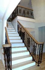 Stair railing with Volutes and Oak toprail in Blacksburg