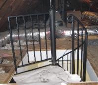 attic landing durring installation showing guard railing 