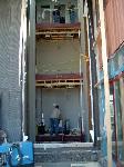 4 story scissor staircase with radial landings  greg is welding it together  this staircase will have luminated glass treads   very dramatic