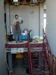 greg is welding this 4 story scissor staircase that will have  illuminated glass treads