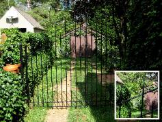 driveway gate fabricated with hammered stock for extra intrest squiggle finials  old southwest va